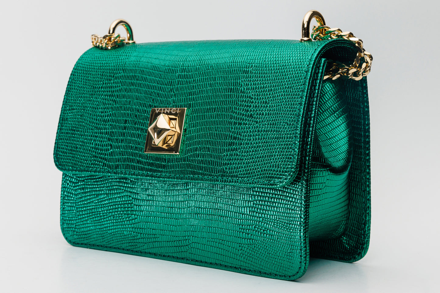 El bolso de mano de piel verde arce