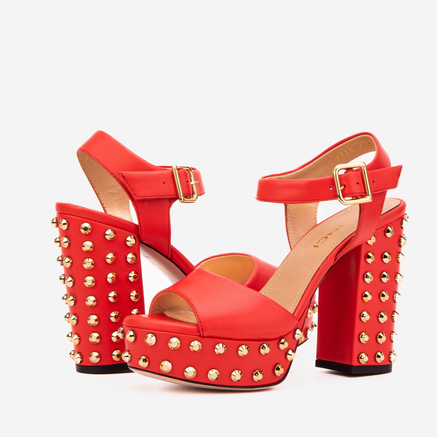 La sandalia de mujer con plataforma y tacón de punta de cuero de gamuza negra Tampico