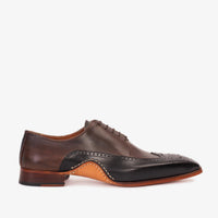 Zapato Oxford con punta de ala en negro y marrón de Royal Hand Craft para hombre